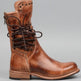 A brown leather lace-up ankle boot with a low block heel, shown in a side profile against a neutral gray background.
