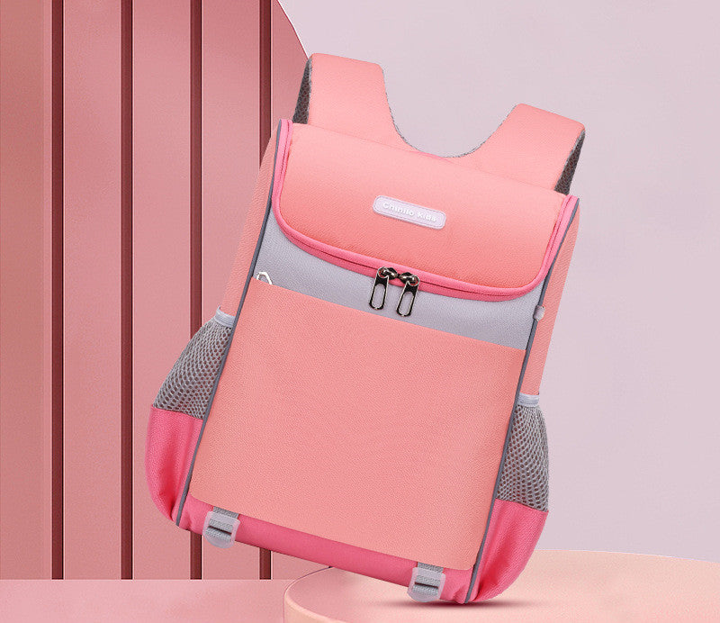 Pink and gray backpack on a pink background