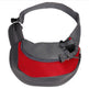 Red and gray pet carrier on a white background