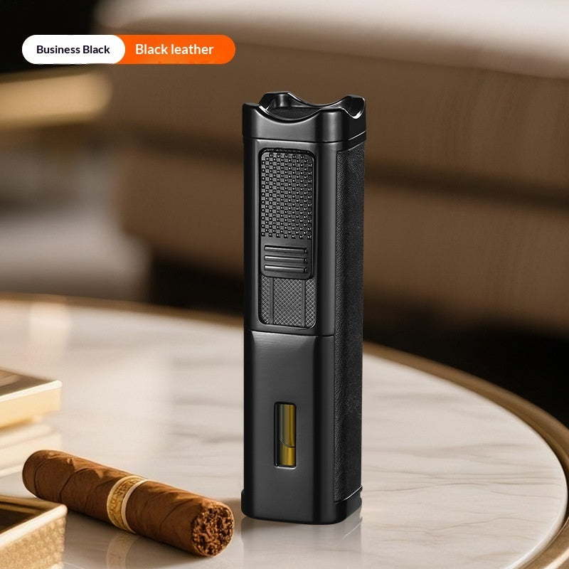 A black leather cigar lighter standing upright on a round marble table, with a cigar resting nearby. The image includes a label at the top left reading 'Business Black' and 'Black leather' to indicate the color variant.