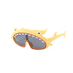 Shark-shaped sunglasses with yellow frame and gray lenses on a white background