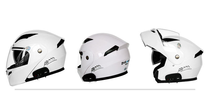Three white motorcycle helmets with black accents on a white background