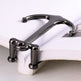 Metallic clip on a magazine with a white background
