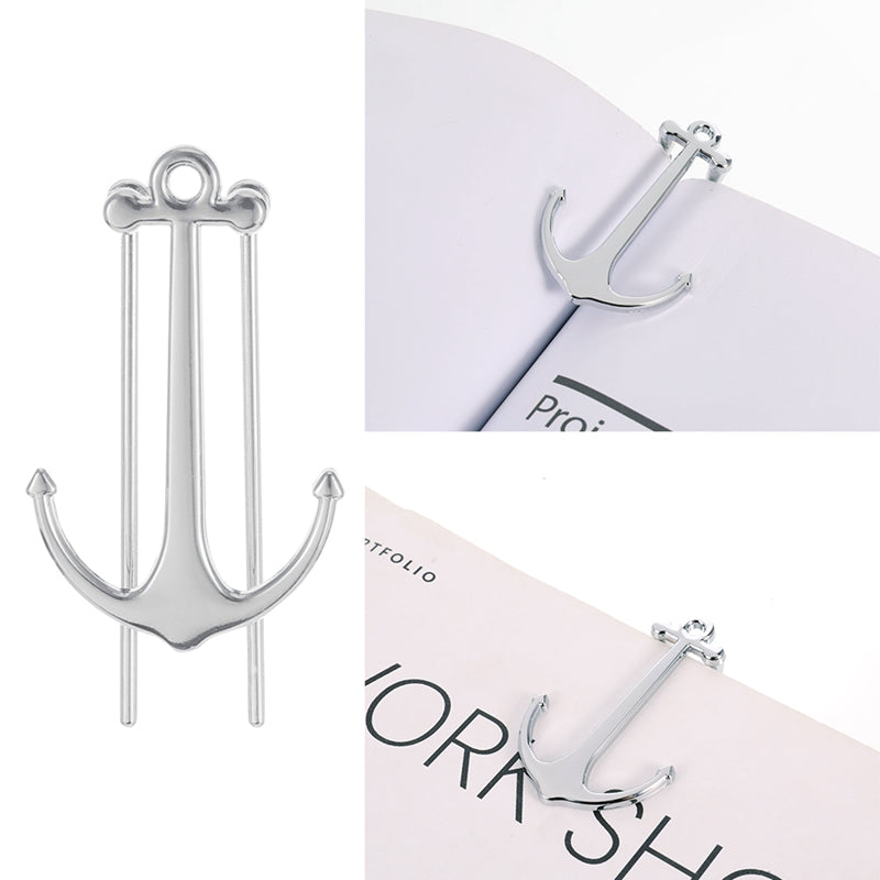 Silver anchor-shaped earrings on a white background
