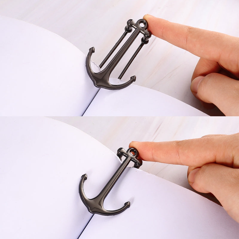 Black anchor-shaped clip on a white background