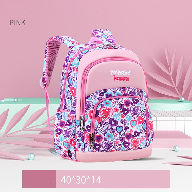 Pink backpack with heart pattern on a pink background