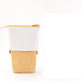 Two-toned pouch with white top and beige bottom on a white background