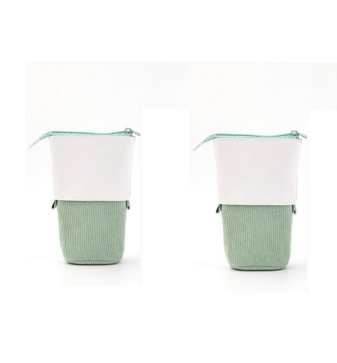 Two green and white bags with zippers on a white background