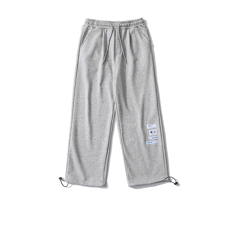 Pantalones Deportivos de Pierna Recta con Etiqueta Bordada – Joggers de Algodón de Corte Holgado en Gris, Azul y Rosa