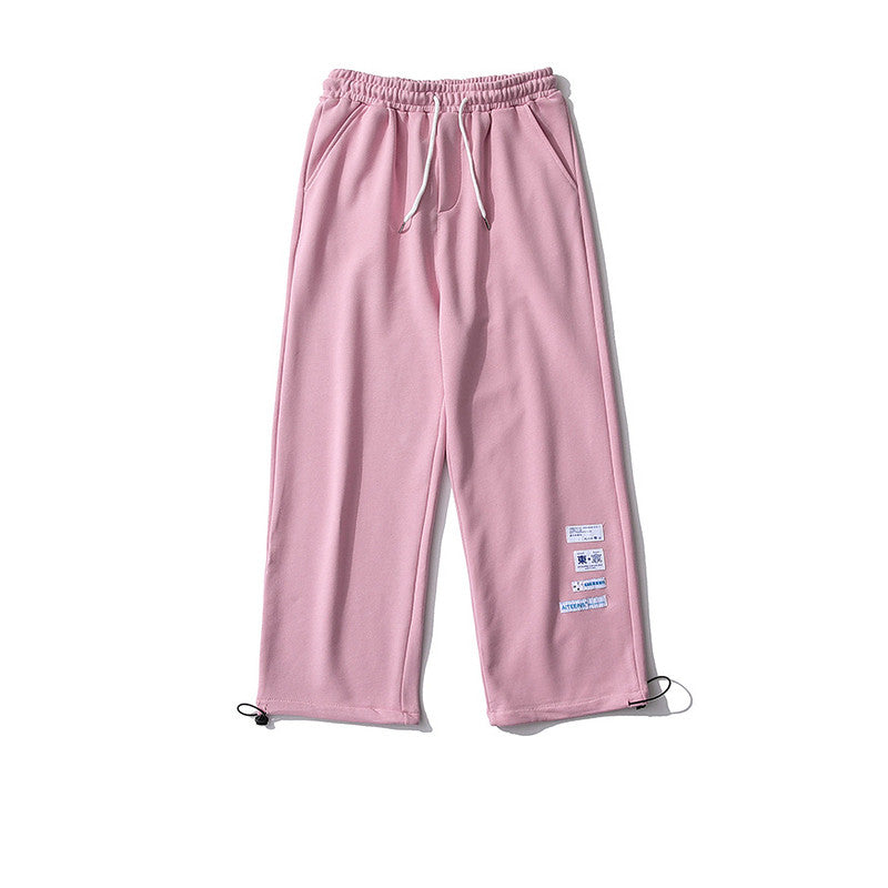 Pantaloni della tuta a gamba dritta con etichetta ricamata – Jogger in cotone a vestibilità larga in grigio, blu e rosa