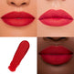 Close-up of red lipstick on lips with a swatch below