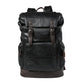 Black leather backpack on a white background