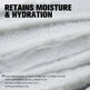 Text on a close-up of a white, creamy substance with 'Retains Moisture & Hydration' text.