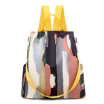 Backpack with abstract pattern and yellow straps on a white background