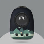 Black pet carrier with mountain design on a gray background