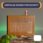 Vintage wooden calculator with display showing '3.000 €' on a table with money and green leaves.