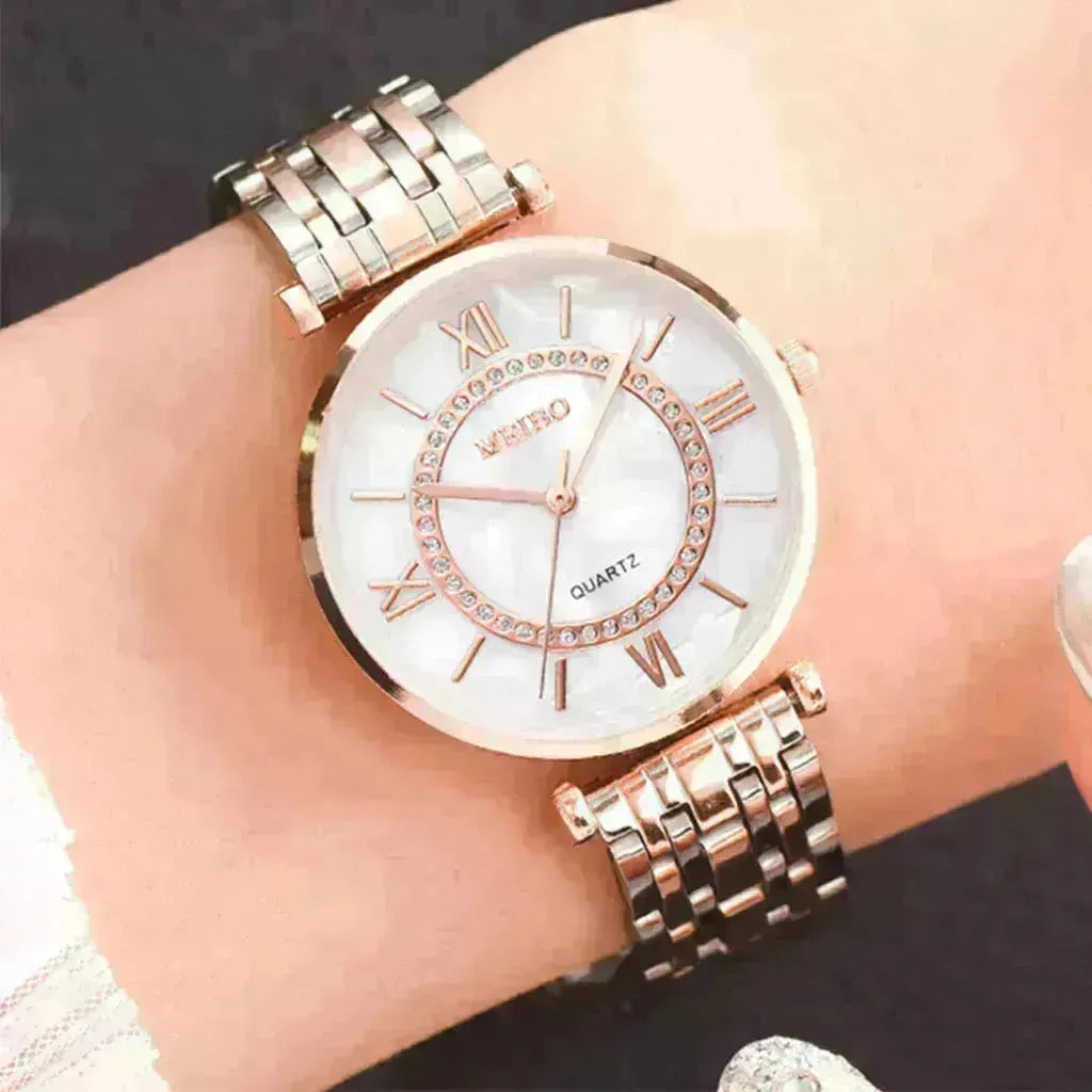 Gold quartz watch for women