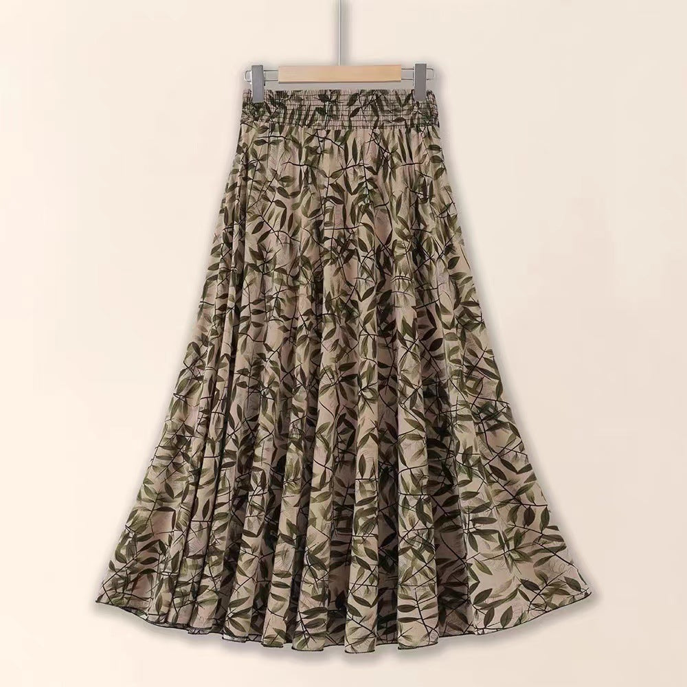 Floral patterned skirt on a hanger against a beige background