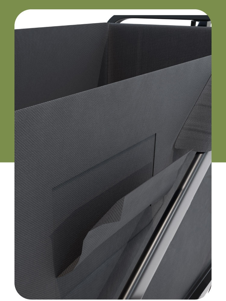 Close-up of a dark gray textured fabric storage bin or organizer pocket with a black frame, shown against a white background with olive green side bars.
