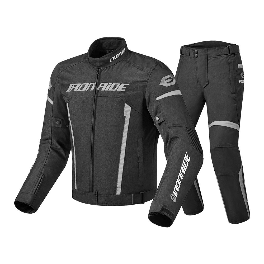 Black motorcycle jacket and pants with 'IOMOTO' branding on a white background