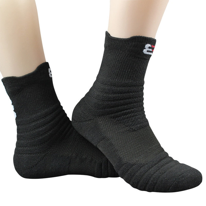 Black socks with brand logo on a white background