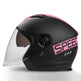 Black motorcycle helmet with pink 'SPEED' logo on a white background