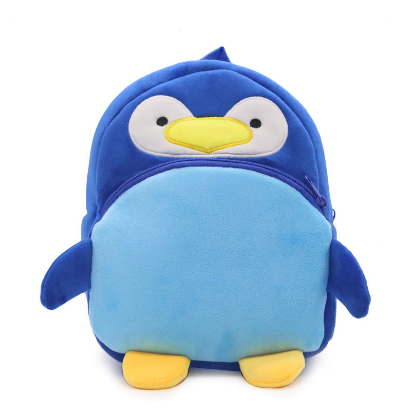 Blue penguin-shaped backpack on a white background