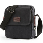 Black shoulder bag with a visible brand logo on a white background