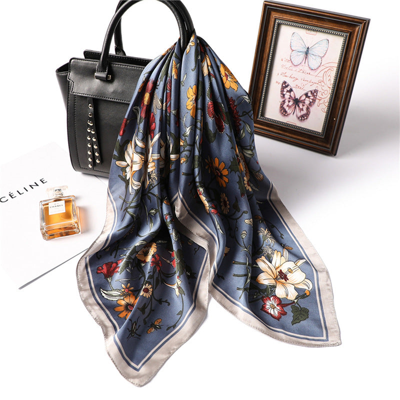 Floral scarf with a black handbag, perfume bottle, and framed picture on a white background Women's Decorative Silk-Style Square Scarf 70x70cm – 15 Prints Canada USA