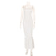 Mannequin wearing a polka dot dress on a white background