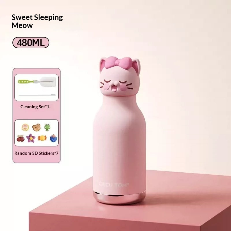 Pink cat-shaped water bottle with cleaning set and stickers on a light pink background