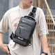 Person wearing a gray crossbody bag with visible branding.