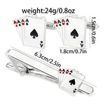 Cufflinks and tie clip with playing card design on a white background
