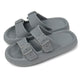 Gray sandals with buckle straps on a white background