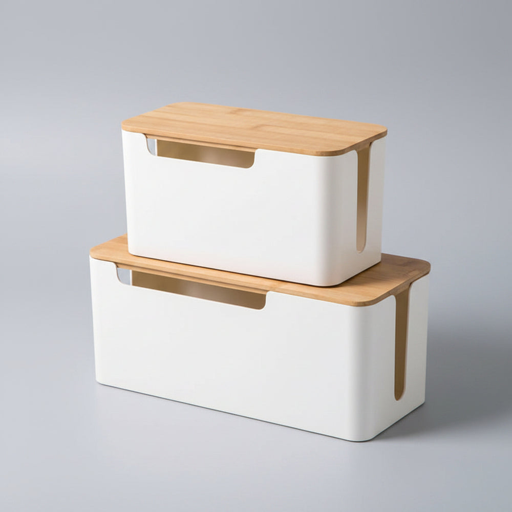 Two wooden and white storage boxes stacked on a green background
