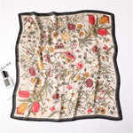 Floral patterned scarf on a white background with Celine branding.