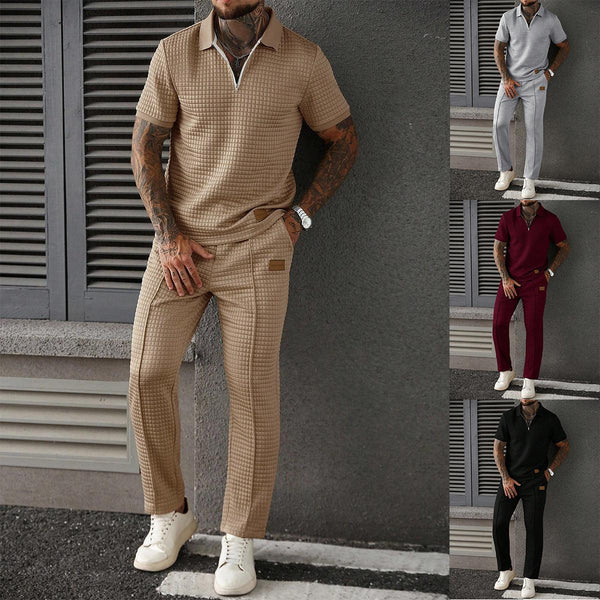 Set da uomo con polo a zip e pantaloni in due pezzi