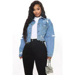 Jeans de mezclilla de manga larga desgarrada de moda