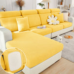 Yellow sofa cover on a sectional sofa with a close-up of the fabric texture.
