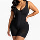Black shapewear bodysuit worn by a model on a white background