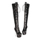 Black sequin knee-high boots on a white background