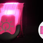 Pink reflective safety vest with a light symbol on a black background