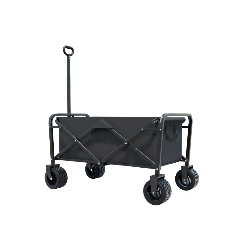 A black folding utility wagon with a canvas side panel, four rugged wheels, and a tall handle, shown on a plain white background.