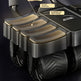 Close-up of a black wheeled exercise/abdominal roller with textured beige grip pads and callout labels pointing to durability, comfort, and breathability.