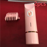 Pink hair trimmer with a comb on a red background