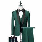 Green suit with black lapels on a mannequin against a white background