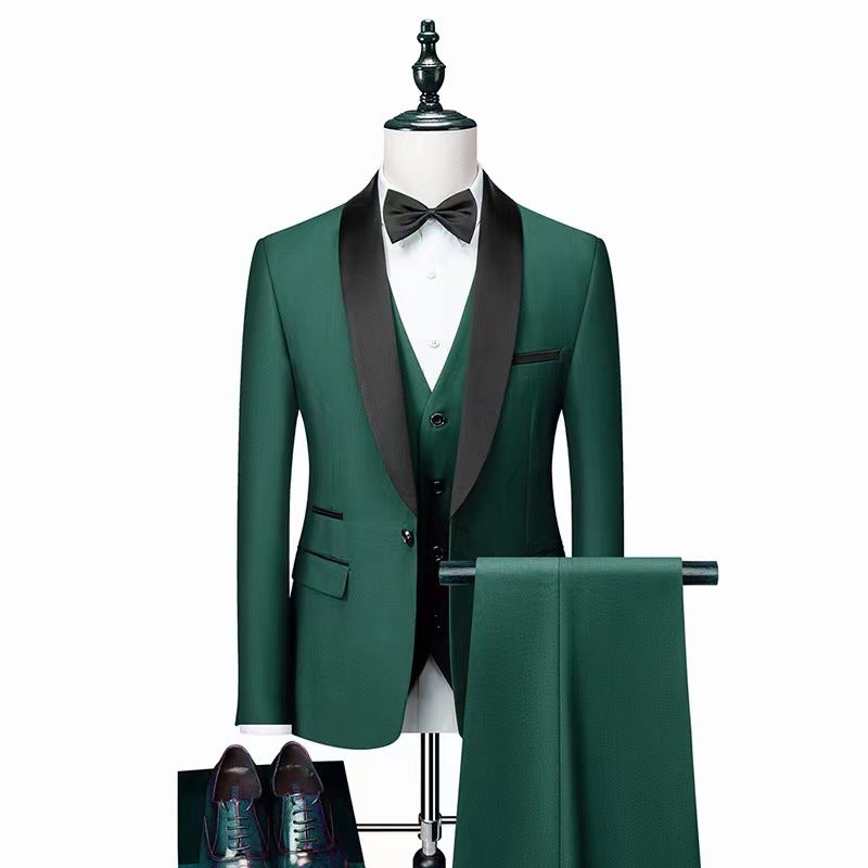Green suit with black lapels on a mannequin against a white background