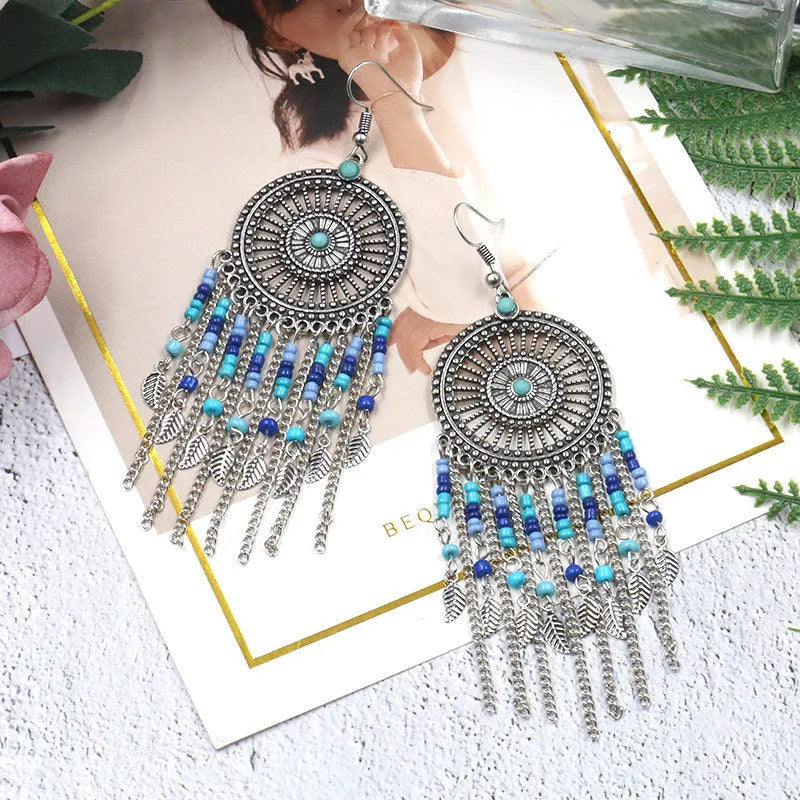 Beaded fringed hollow earrings - EX-STOCK CANADA