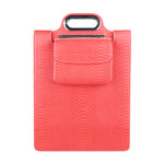 Pink textured clutch bag with a handle on a white background