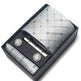 Men's accessory set with tie, cufflinks, and pocket square in a black box on a white background